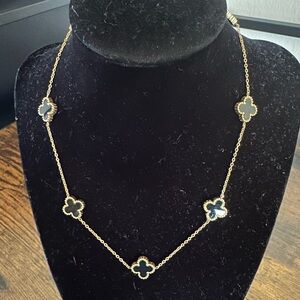 Elegant Gold and Black Clover Necklace